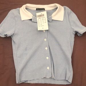 This is a Brandy Melville Button down top.